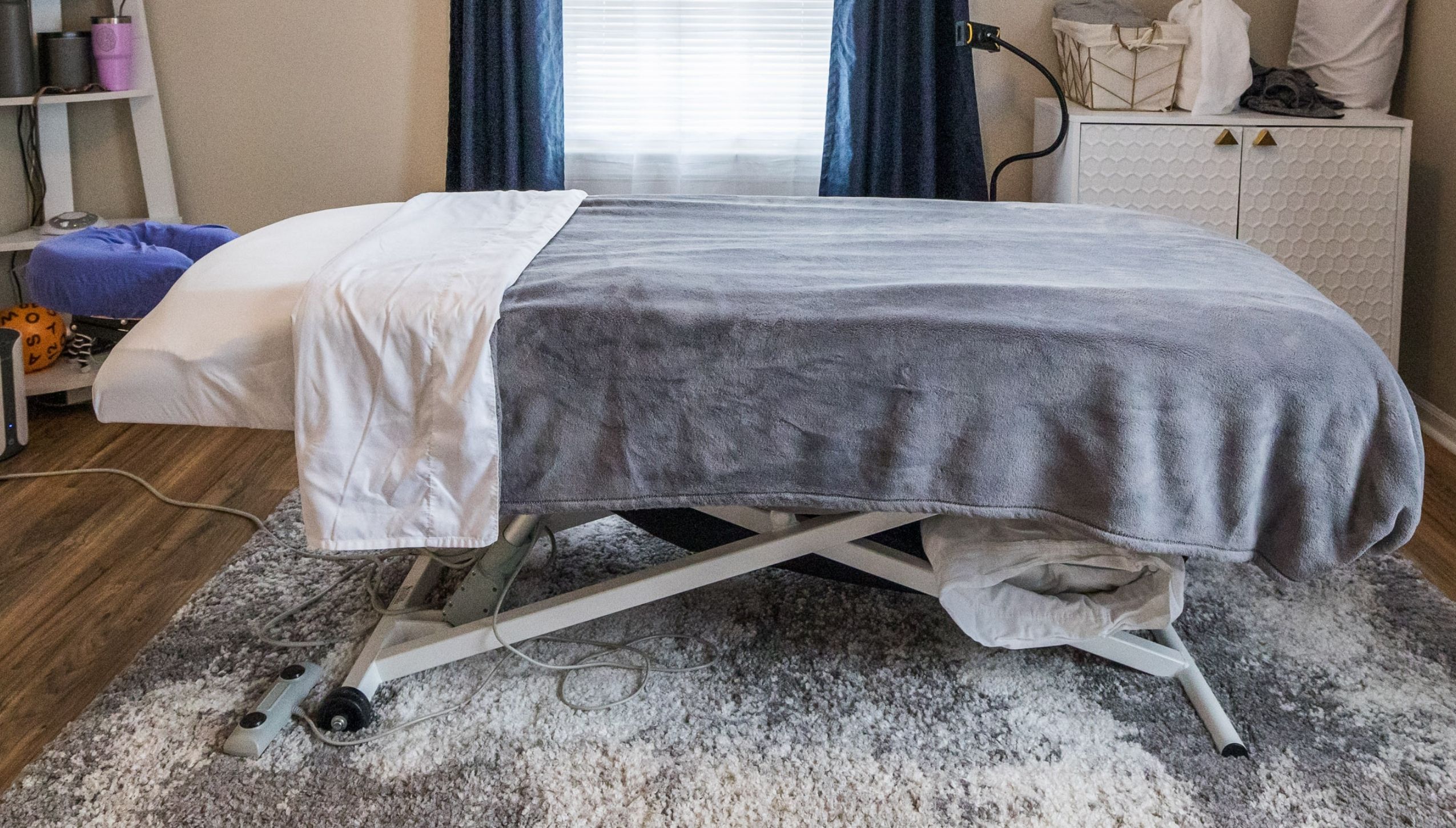 Dr. RJ Burr treating a patient at REACH Rehab + Chiropractic in Plymouth, MI